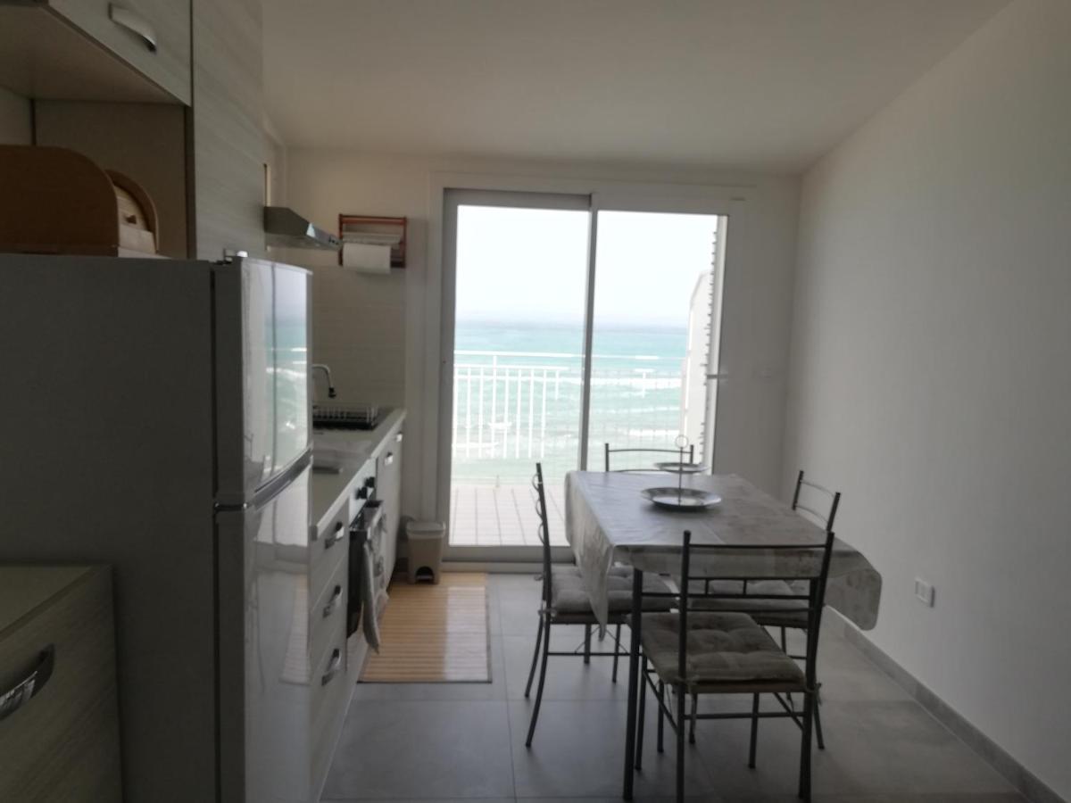 Attico Fronte Mare Apartment มาร์ตินซิกูโร ภายนอก รูปภาพ